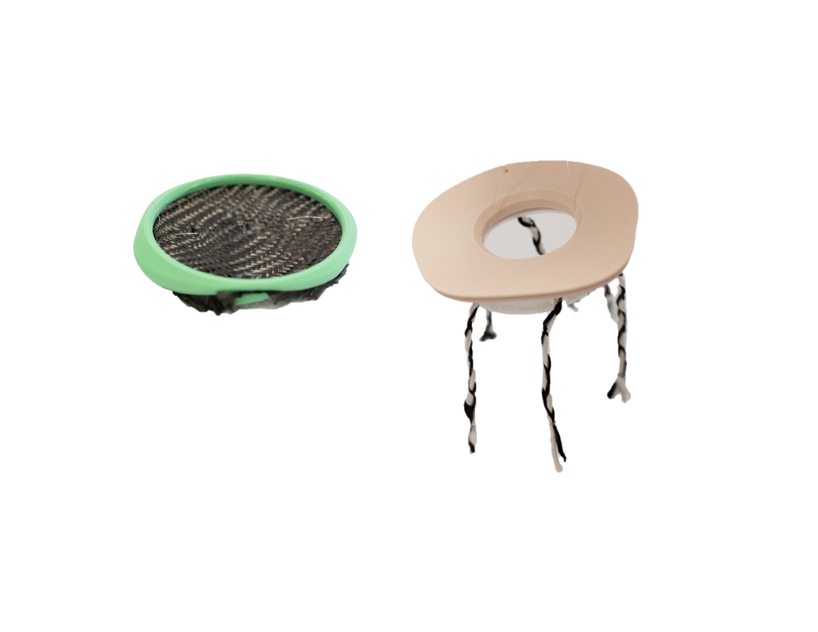 HBPV electrodes — photograph of the assembled cathode (green ring with metal mesh) and anode (cream disc with twisted wire braids)